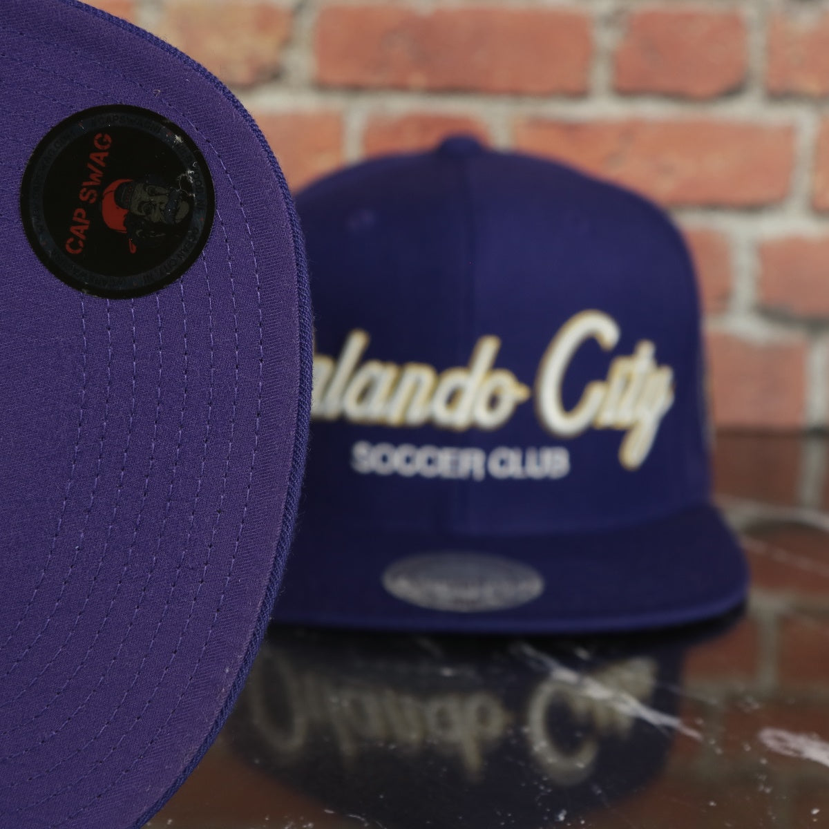 Orlando City Lions Mitchell and Ness Script Snapback Hat