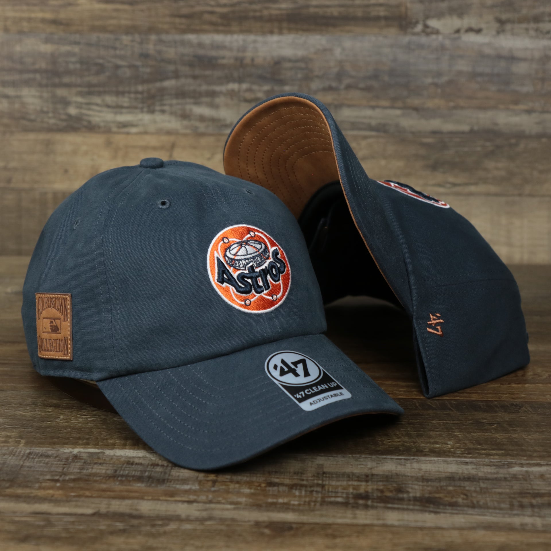 The Cooperstown Houston Astros Cooperstown Collection Side Patch Leather Brown Undervisor Dad Hat | Vintage Navy Dad Hat