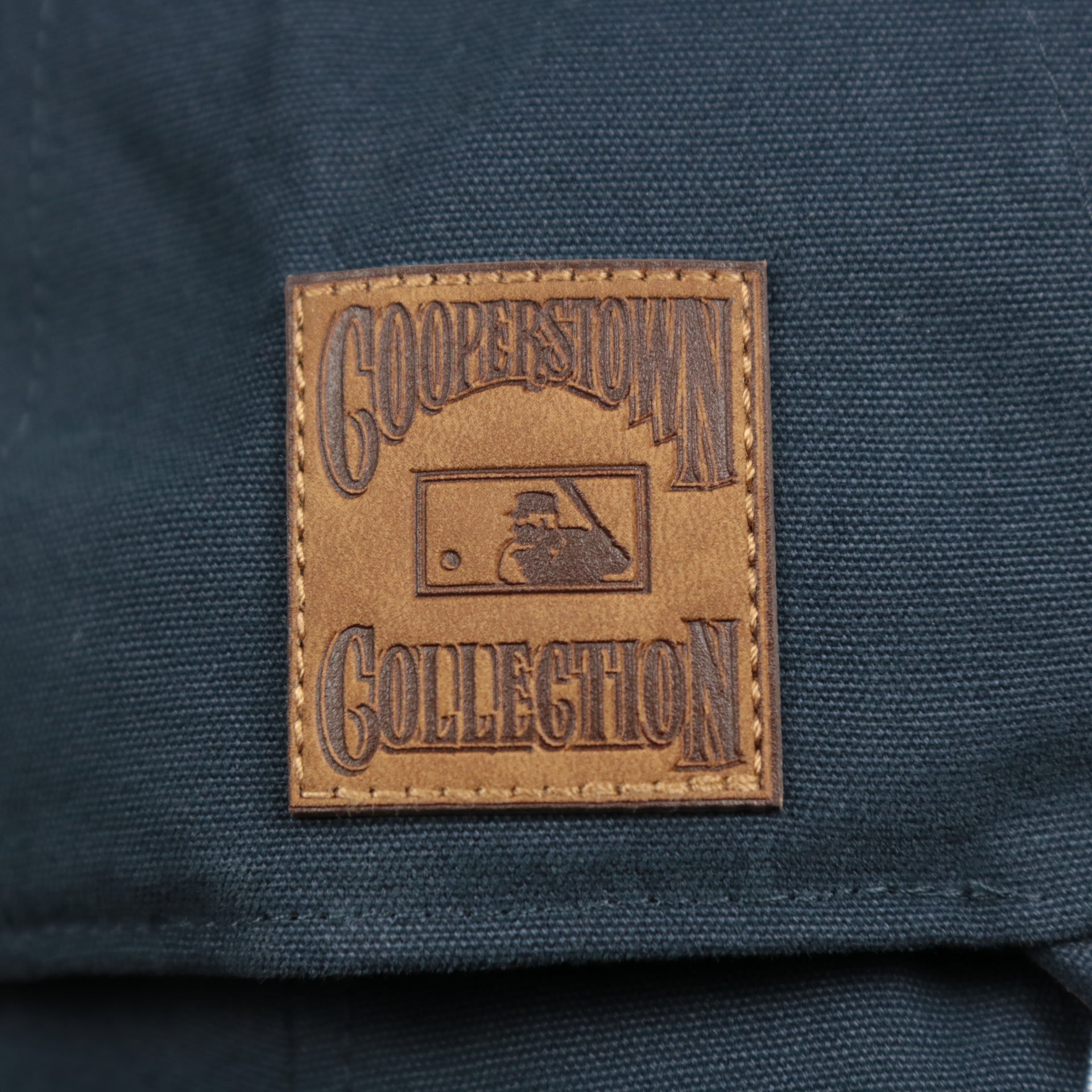 The Cooperstown Collection Patch on the Cooperstown Houston Astros Cooperstown Collection Side Patch Leather Brown Undervisor Dad Hat | Vintage Navy Dad Hat
