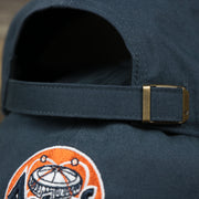 The Navy Adjustable Strap on the Cooperstown Houston Astros Cooperstown Collection Side Patch Leather Brown Undervisor Dad Hat | Vintage Navy Dad Hat