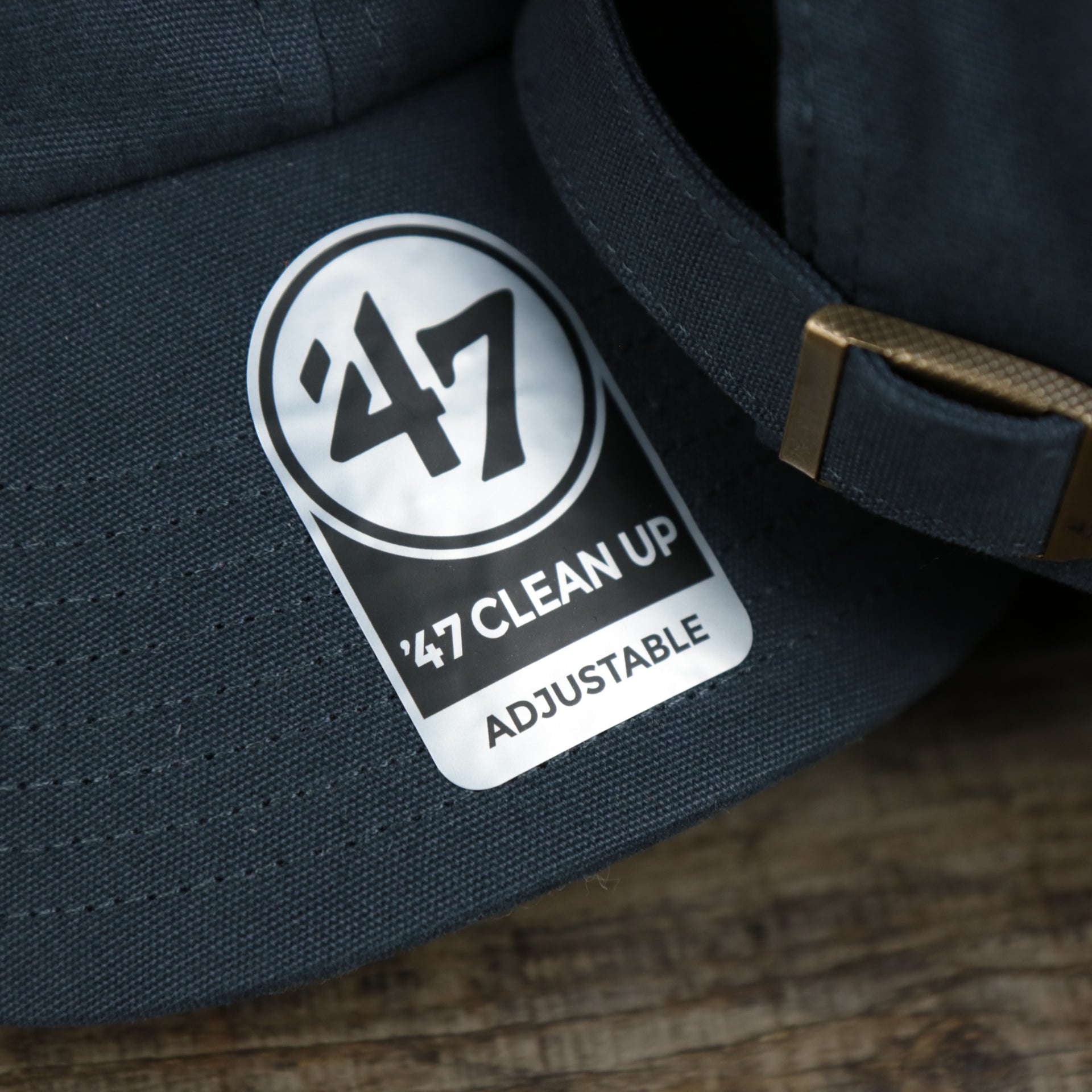 The 47 Clean Up Sticker on the Cooperstown Houston Astros Cooperstown Collection Side Patch Leather Brown Undervisor Dad Hat | Vintage Navy Dad Hat