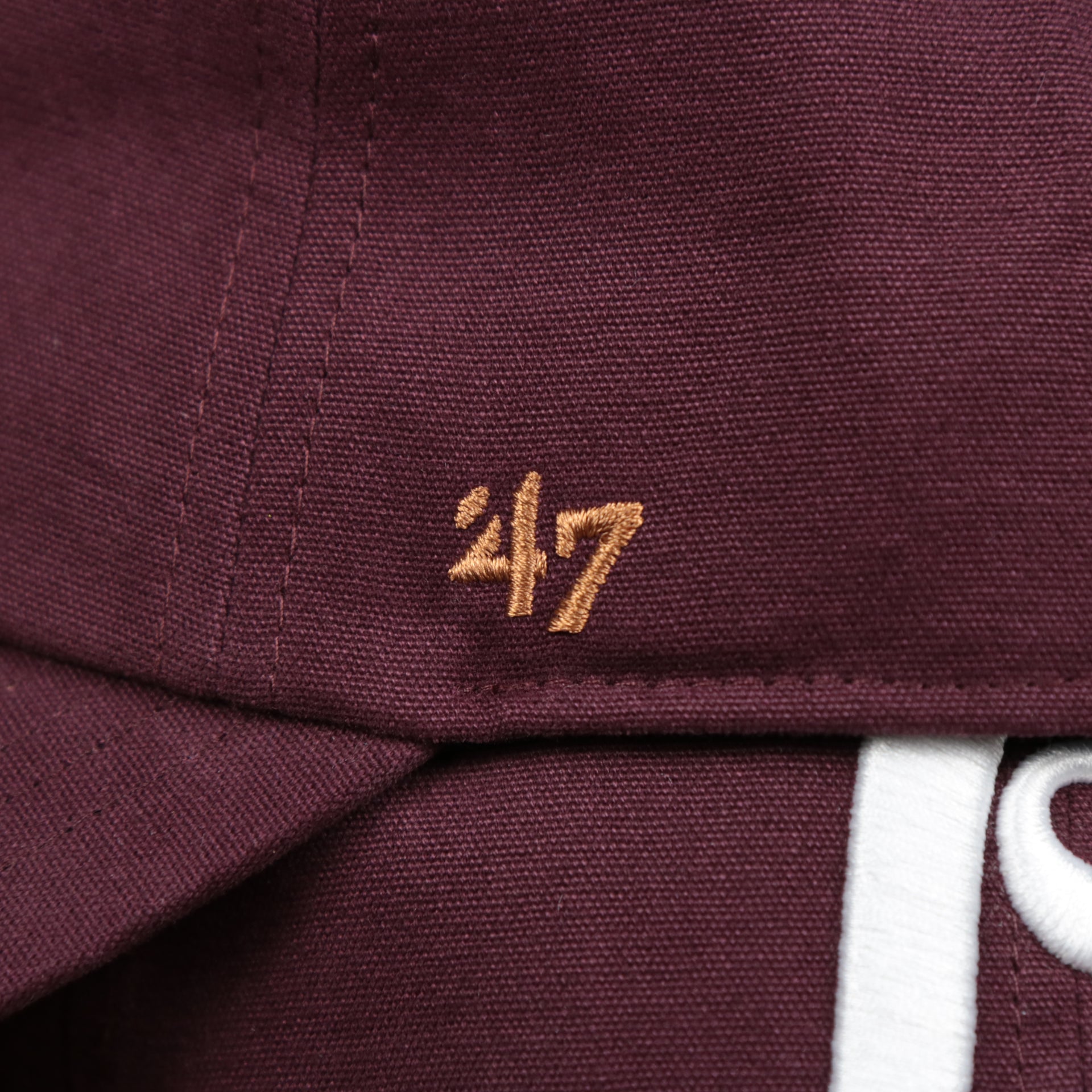 The 47 Brand Logo on the Cooperstown Philadelphia Phillies Cooperstown Collection Side Patch Leather Brown Undervisor Dad Hat | Maroon Dad Hat