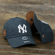 The Cooperstown New York Yankees Cooperstown Collection Side Patch Leather Brown Undervisor Dad Hat | Vintage Navy Dad Hat