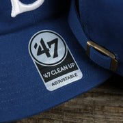 The 47 Brand Clean Up Sticker on the Cooperstown Brooklyn Dodgers Cooperstown Collection Side Patch Leather Brown Undervisor Dad Hat | Vintage Royal Blue Dad Hat