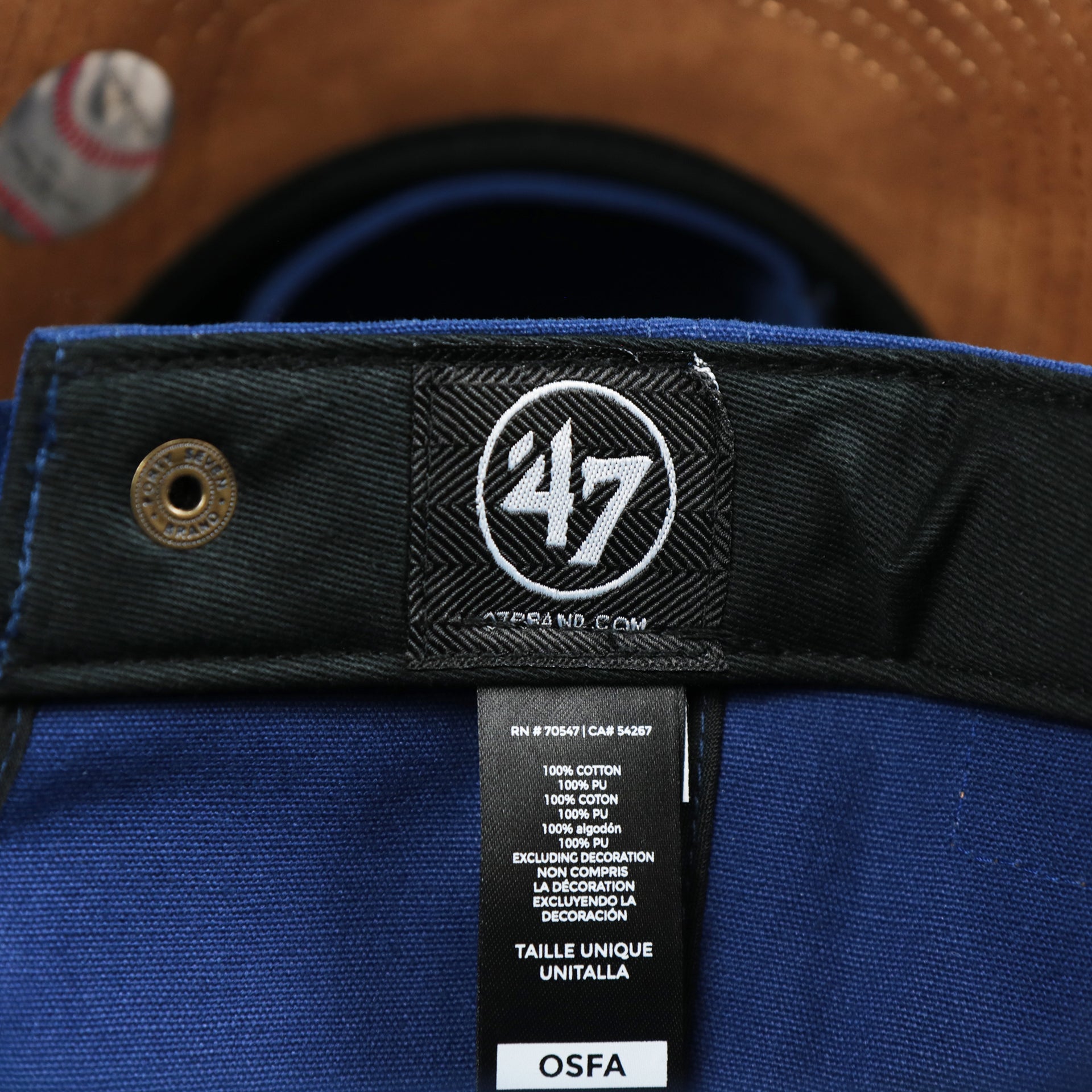 The 47 Brand Tag on the Cooperstown Brooklyn Dodgers Cooperstown Collection Side Patch Leather Brown Undervisor Dad Hat | Vintage Royal Blue Dad Hat