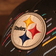 Close up of the Pittsburgh Steelers logo embroidered on the front of the Pittsburgh Steelers NFL 2021 Crucial Catch Cancer Awareness 39Thirty Stretch Fit Cap
