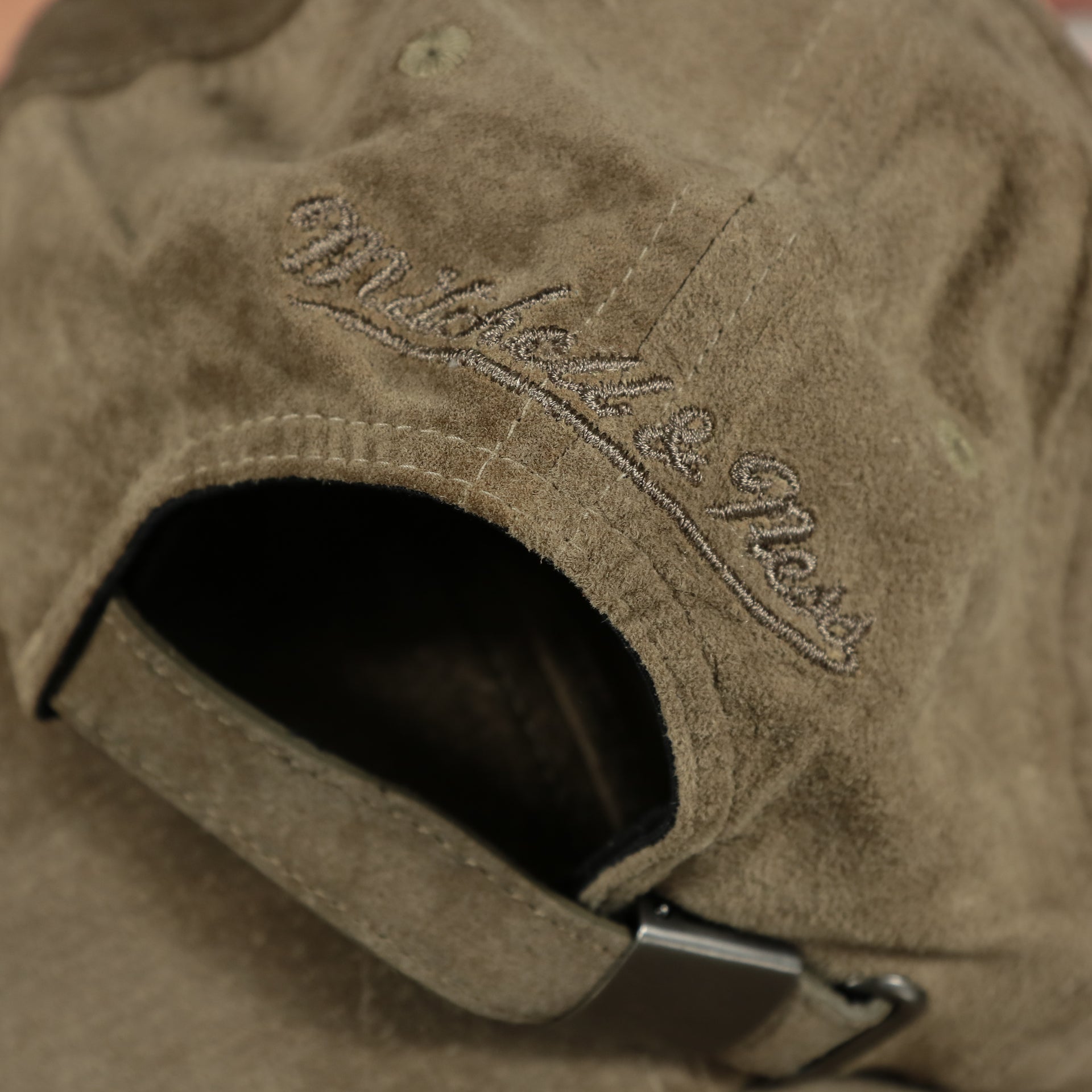 mitchell and ness logo on the Mitchell and Ness Light Brown Suede Blank Adjustable Dad Hat