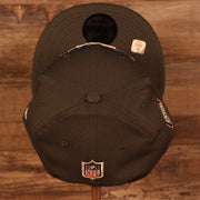 Top down of the view of the NFL Shield 2021 Crucial Catch Breast Cancer Awareness 9Fifty Snapback Hat