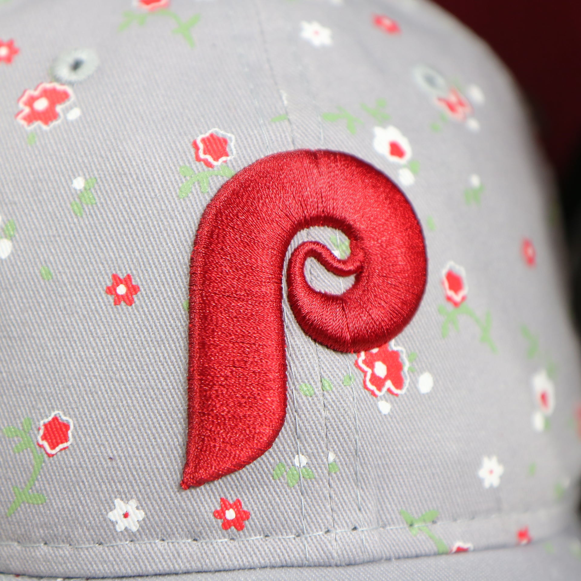 close up of the Phillies logo on the Philadelphia Phillies Ladies Cooperstown Floral Bloom Micro Flower Pattern 9Twenty Dad Hat | Womens Floral Phillies Hat