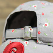 metallic buckle and adjustable strap on the Philadelphia Phillies Ladies Cooperstown Floral Bloom Micro Flower Pattern 9Twenty Dad Hat | Womens Floral Phillies Hat