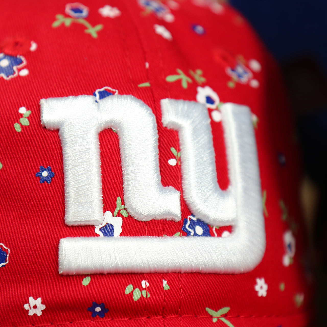 close up of the giants logo on the New York Giants Ladies Floral Bloom Micro Flower Pattern 9Twenty Dad Hat | Womens Floral Giants Hat