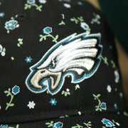 close up of the eagles logo on the Philadelphia Eagles Ladies Floral Bloom Micro Flower Pattern 9Twenty Dad Hat | Womens Floral Eagles Hat