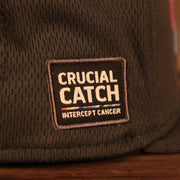 Zoomed in View of Crucial Catch on this New York Giants Breast Cancer Awareness 9Fifty Snapback Cap
