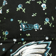 new era logo on the Philadelphia Eagles Ladies Floral Bloom Micro Flower Pattern 9Twenty Dad Hat | Womens Floral Eagles Hat