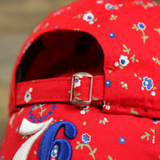 metallic buckle and adjustable strap on the Philadelphia 76ers Ladies Floral Bloom Micro Flower Pattern 9Twenty Dad Hat | Womens Floral 76ers Hat