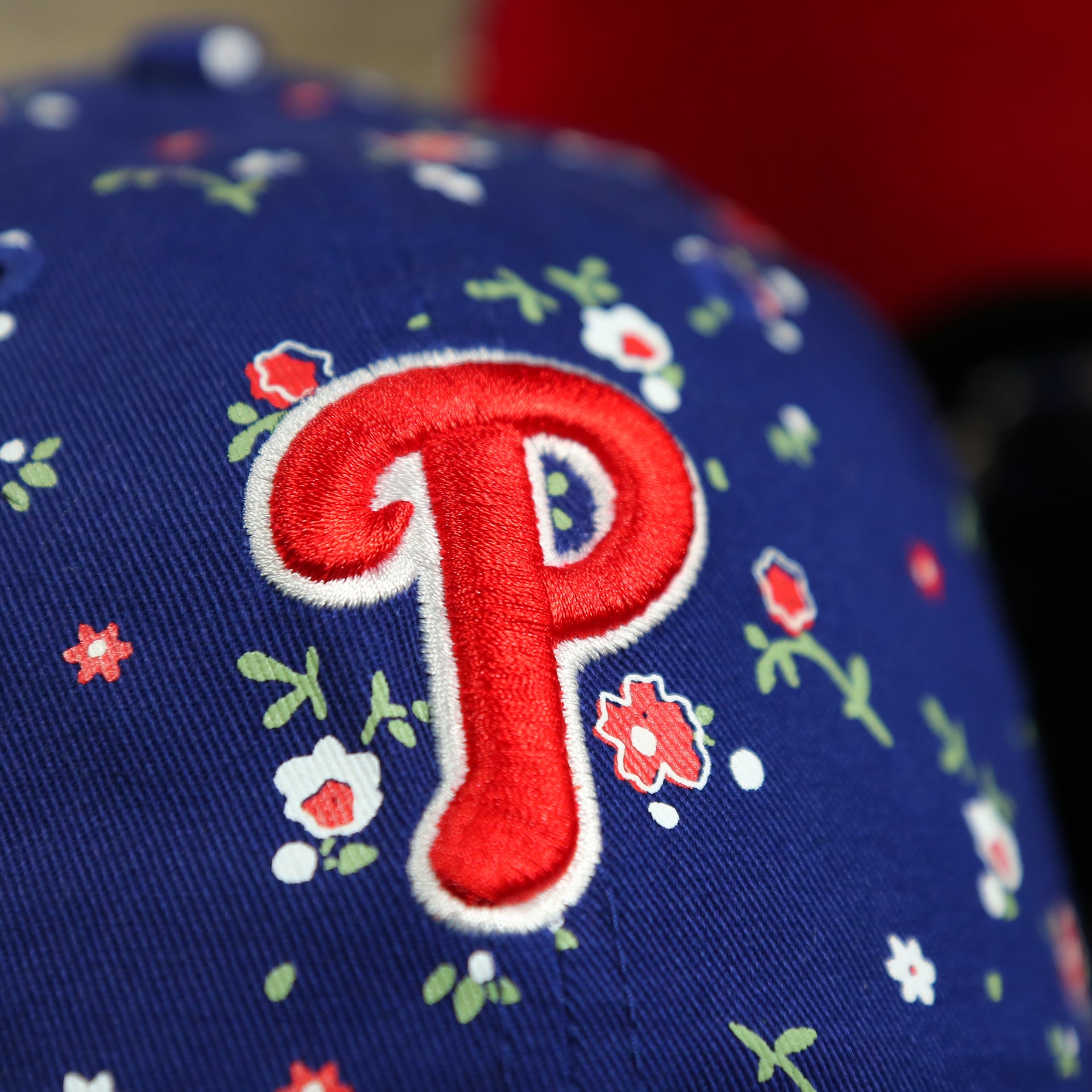 close up of the Phillies logo on the Philadelphia Phillies Ladies Floral Bloom Micro Flower Pattern 9Twenty Dad Hat | Womens Floral Phillies Hat