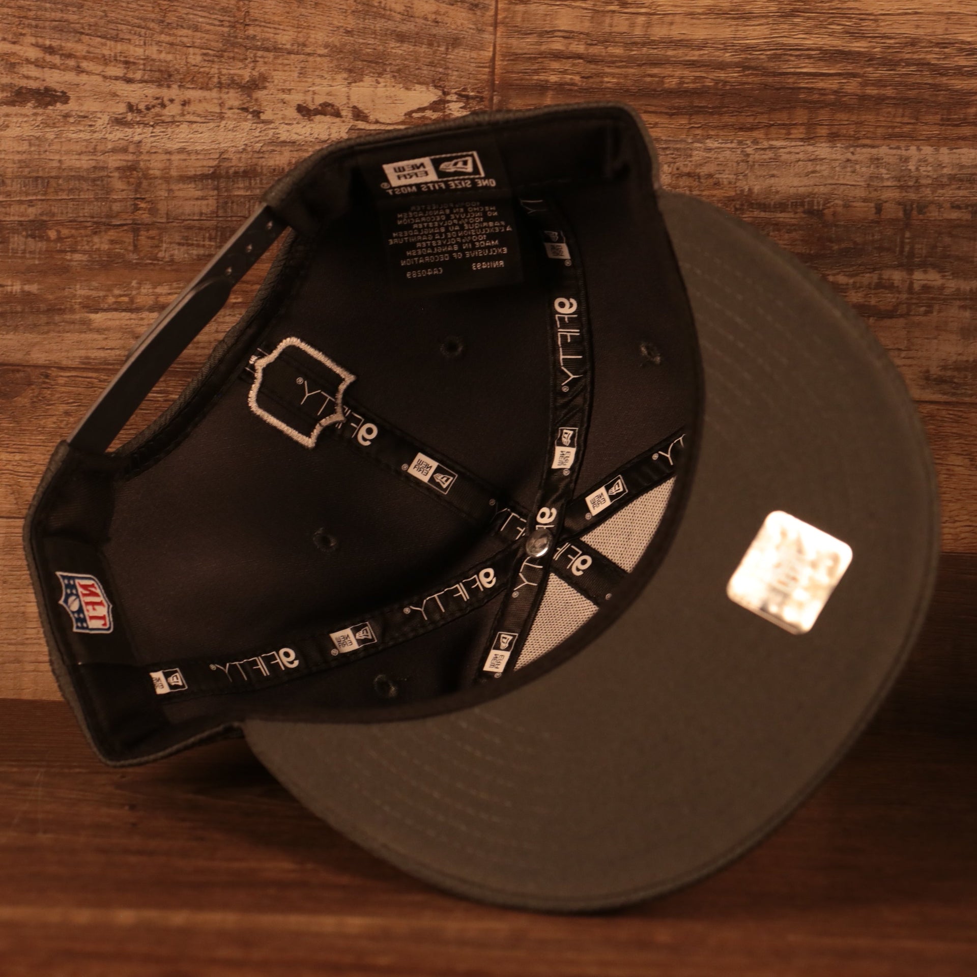 Dark gray under visor of the Philadelphia Eagles NFL 2021 Crucial Catch Breast Cancer Awareness 9Fifty Snapback Hat