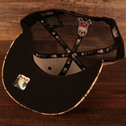 Black under visor of the Philadelphia Eagles 2021 Salute To Service On Field Sideline 9Fifty Snapback Trucker Hat