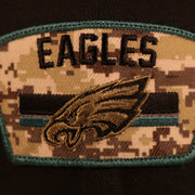 Front patch logo on the Philadelphia Eagles 2021 Salute To Service On Field Sideline 9Fifty Snapback Trucker Hat