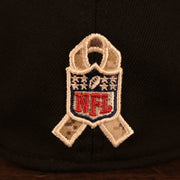 Close up of the NFL Salute to Service ribbon on the back of the Philadelphia Eagles 2021 Salute To Service On Field Sideline 39Thirty Stretch Fit Hat