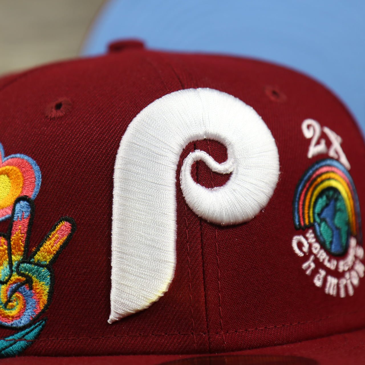 close up of the Phillies logo on the Philadelphia Phillies Cooperstown Groovy World Series Champions Patch 59Fifty Fitted Cap | New Era Groovy Side Patch 5950