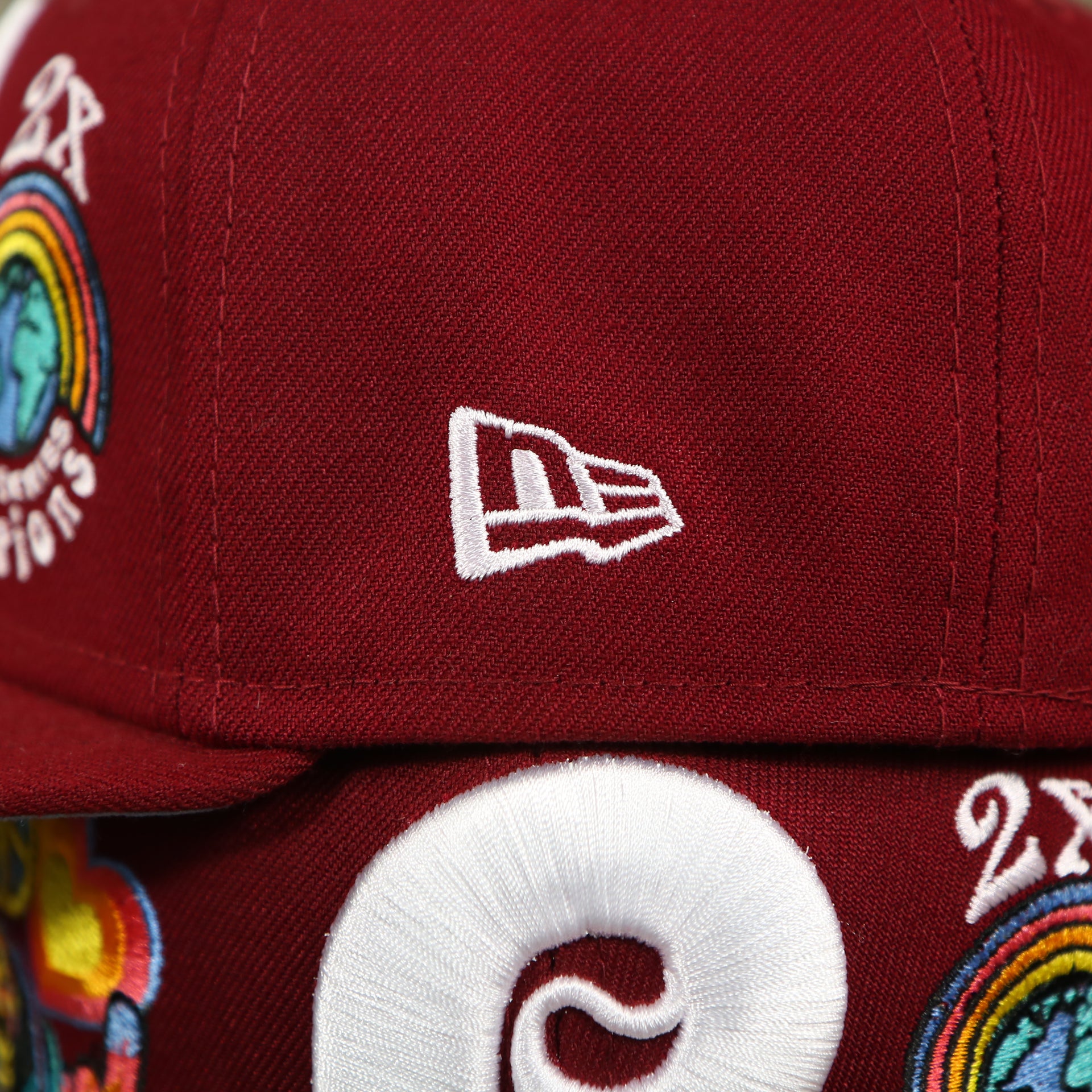 new era logo on the Philadelphia Phillies Cooperstown Groovy World Series Champions Patch 59Fifty Fitted Cap | New Era Groovy Side Patch 5950