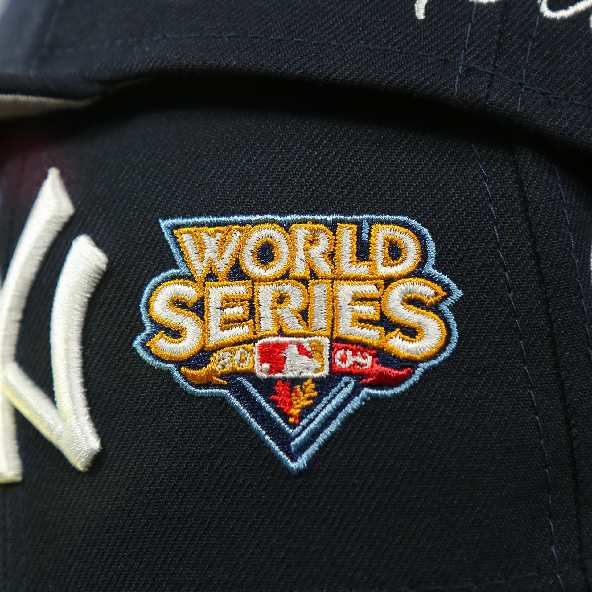 2009 world series patch on the New York Yankees Cooperstown All Over Side Patch "Historic Champs" Gray UV 59Fifty Fitted Cap | Navy 59Fifty Fitted Cap