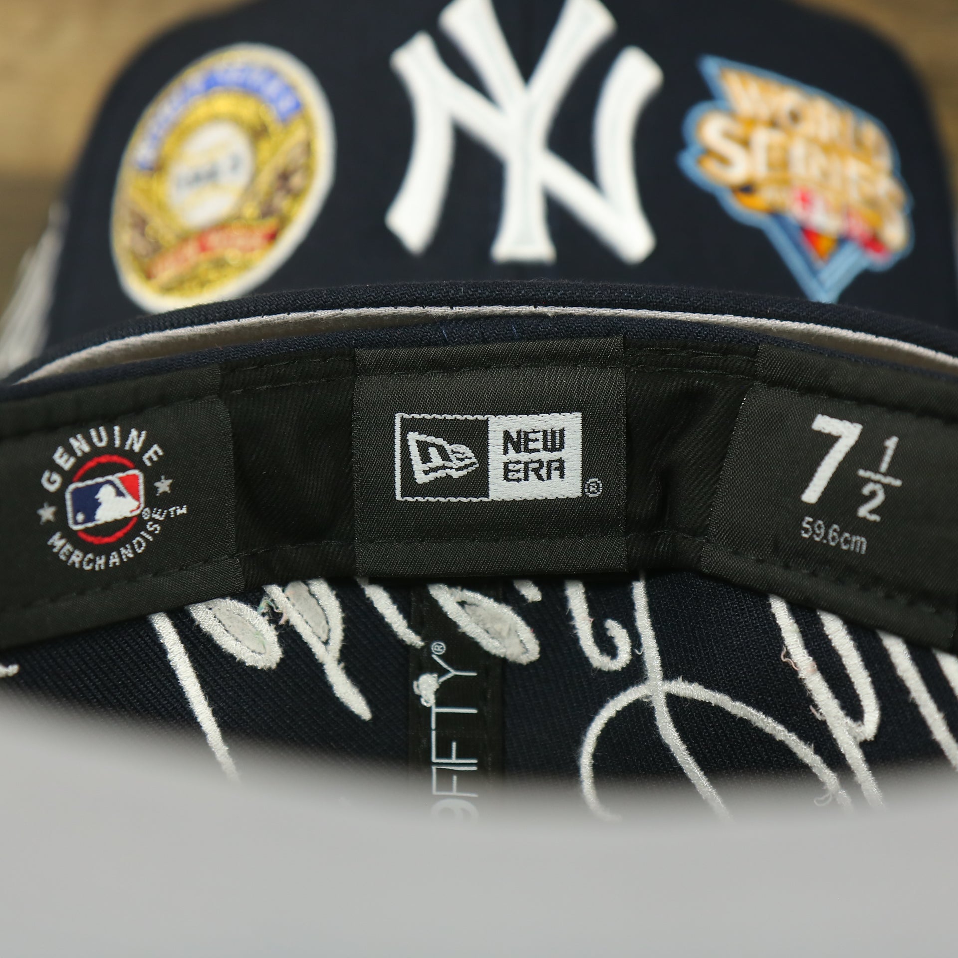 MLB and new era label on the New York Yankees Cooperstown All Over Side Patch "Historic Champs" Gray UV 59Fifty Fitted Cap | Navy 59Fifty Fitted Cap