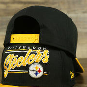yellow adjustable snap on the Pittsburgh Steelers "Team Script" College Bar 9Fifty Snapback Hat | Black/Yellow Steelers 950 Snap Cap