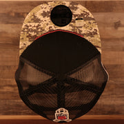 Top down view of the NFL Shield 2021 Salute To Service On Field Sideline 9Fifty Snapback Trucker Hat