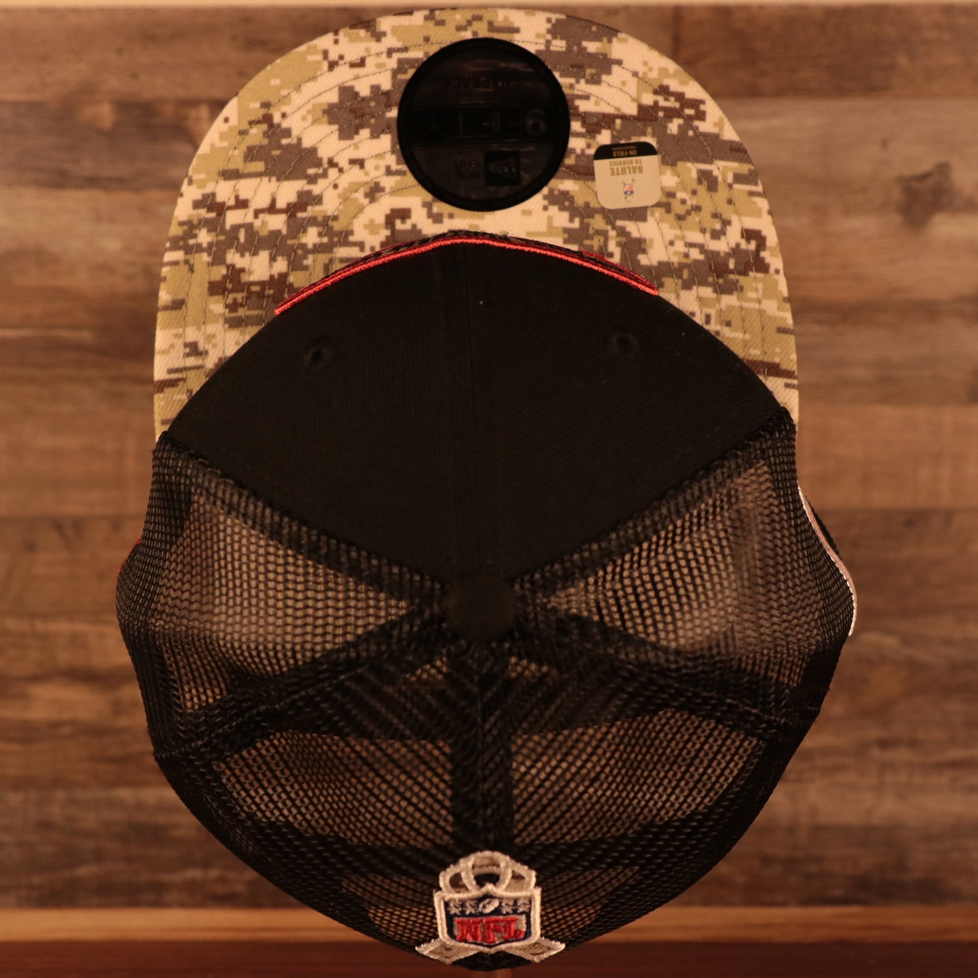 Top down view of the NFL Shield 2021 Salute To Service On Field Sideline 9Fifty Snapback Trucker Hat