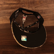 Black bottom on the New York Giants 2021 Salute To Service On Field Sideline 9Fifty Snapback Trucker Hat