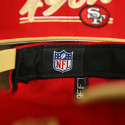NFL label on the San Francisco 49ers Team Script College Bar 9Fifty Snapback Hat | Red/Tan 49ers 950 Snap Cap