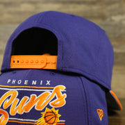 orange adjustable snap on the Phoenix Suns Team Script College Bar 9Fifty Snapback Hat | Purple/Orange Suns 950 Snap Cap