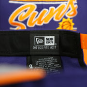 new era label on the Phoenix Suns Team Script College Bar 9Fifty Snapback Hat | Purple/Orange Suns 950 Snap Cap