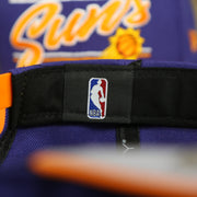 NBA label on the Phoenix Suns Team Script College Bar 9Fifty Snapback Hat | Purple/Orange Suns 950 Snap Cap