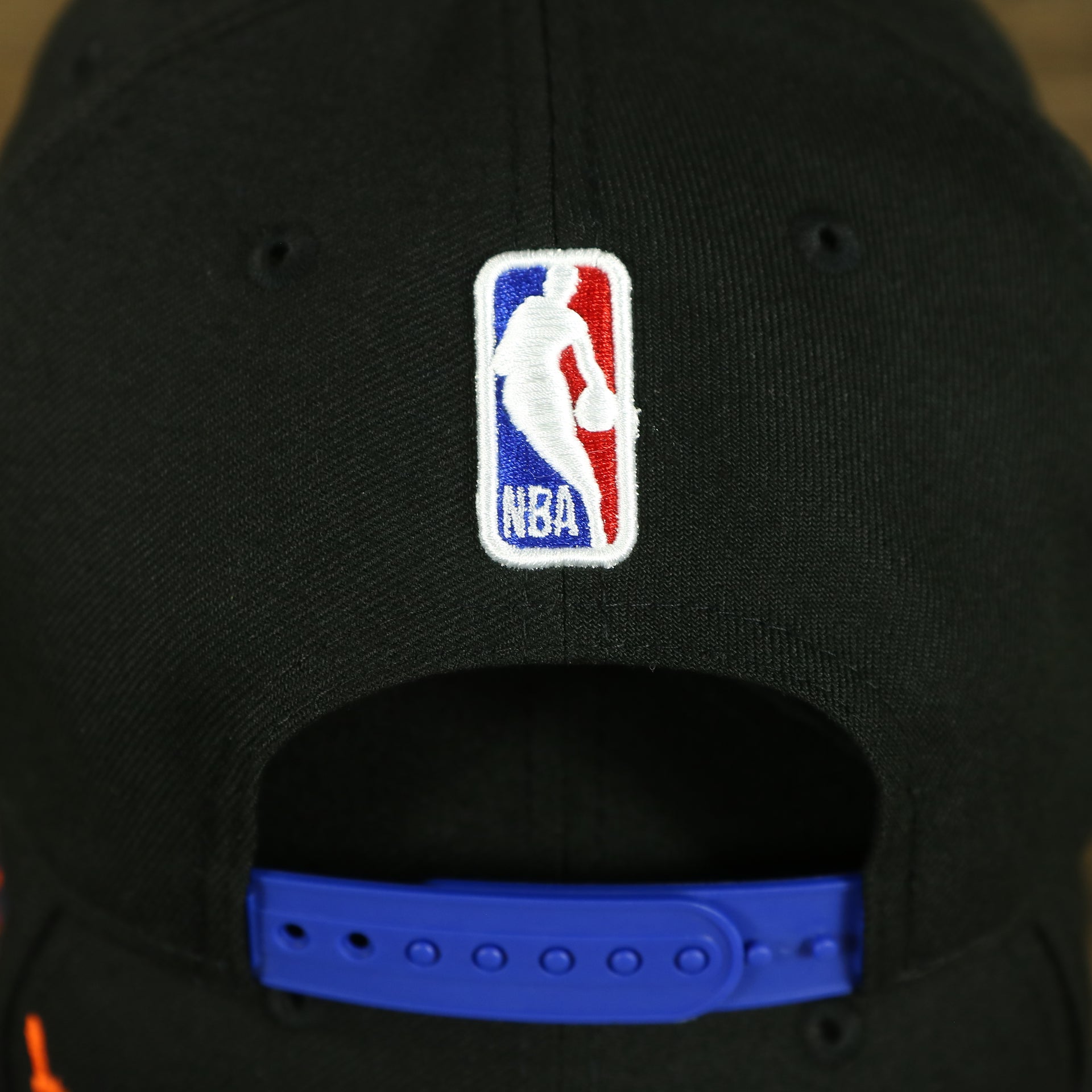 nba logo on the New York Knicks City Skyline Side Patch 9Fifty Snapback Hat | New York Skyline 950