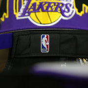nba label on the Los Angeles Lakers City Skyline Side Patch 9Fifty Snapback Hat | Los Angeles Skyline 950
