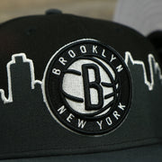 nets logo on the Brooklyn Nets Skyline Side Patch 9Fifty Snapback Hat | Brooklyn Skyline 950