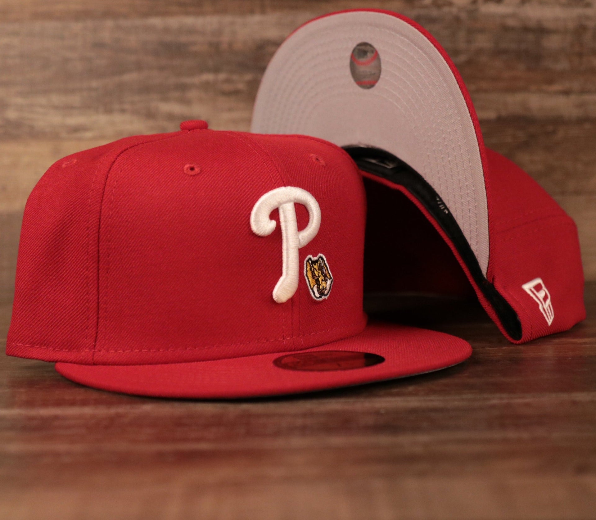 The red Philadelphia Phillies Cheesesteak on the front side patch fitted cap.
