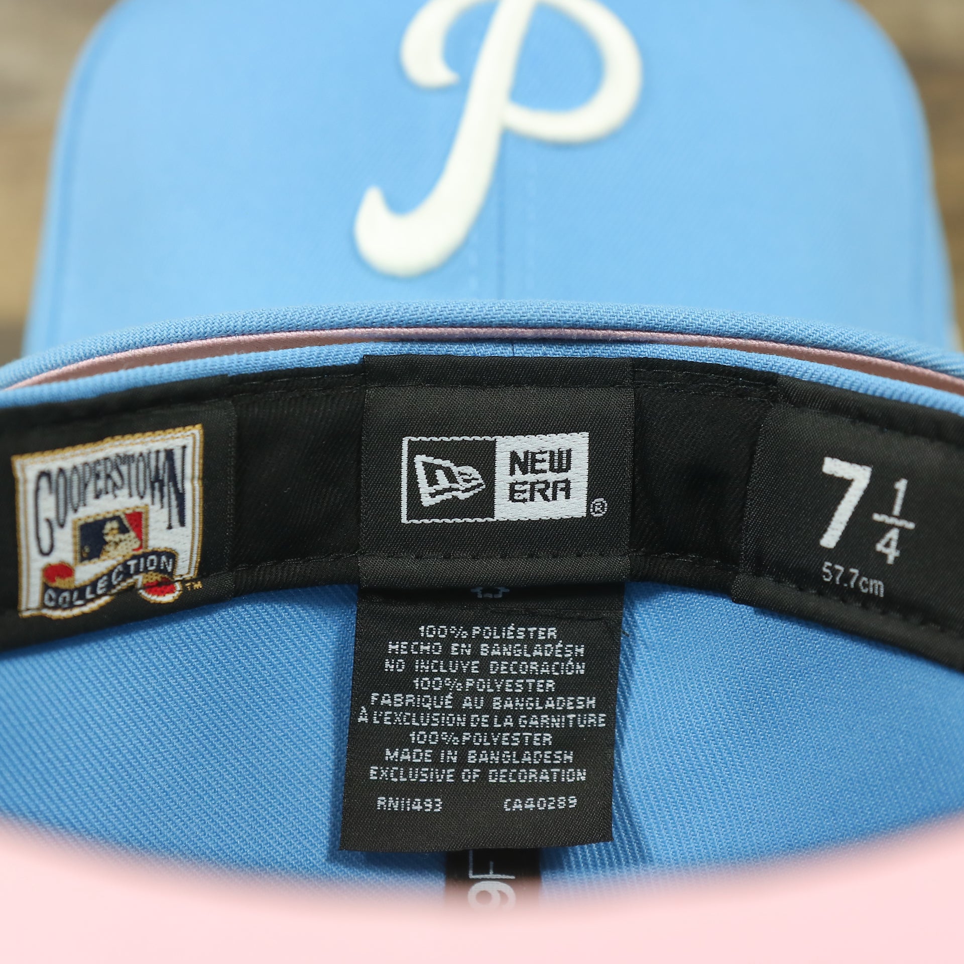 mlb and new era label on the Philadelphia Phillies Glow In The Dark 1952 All Star Game Patch Pink Bottom Side Patch 59Fifty Fitted Cap