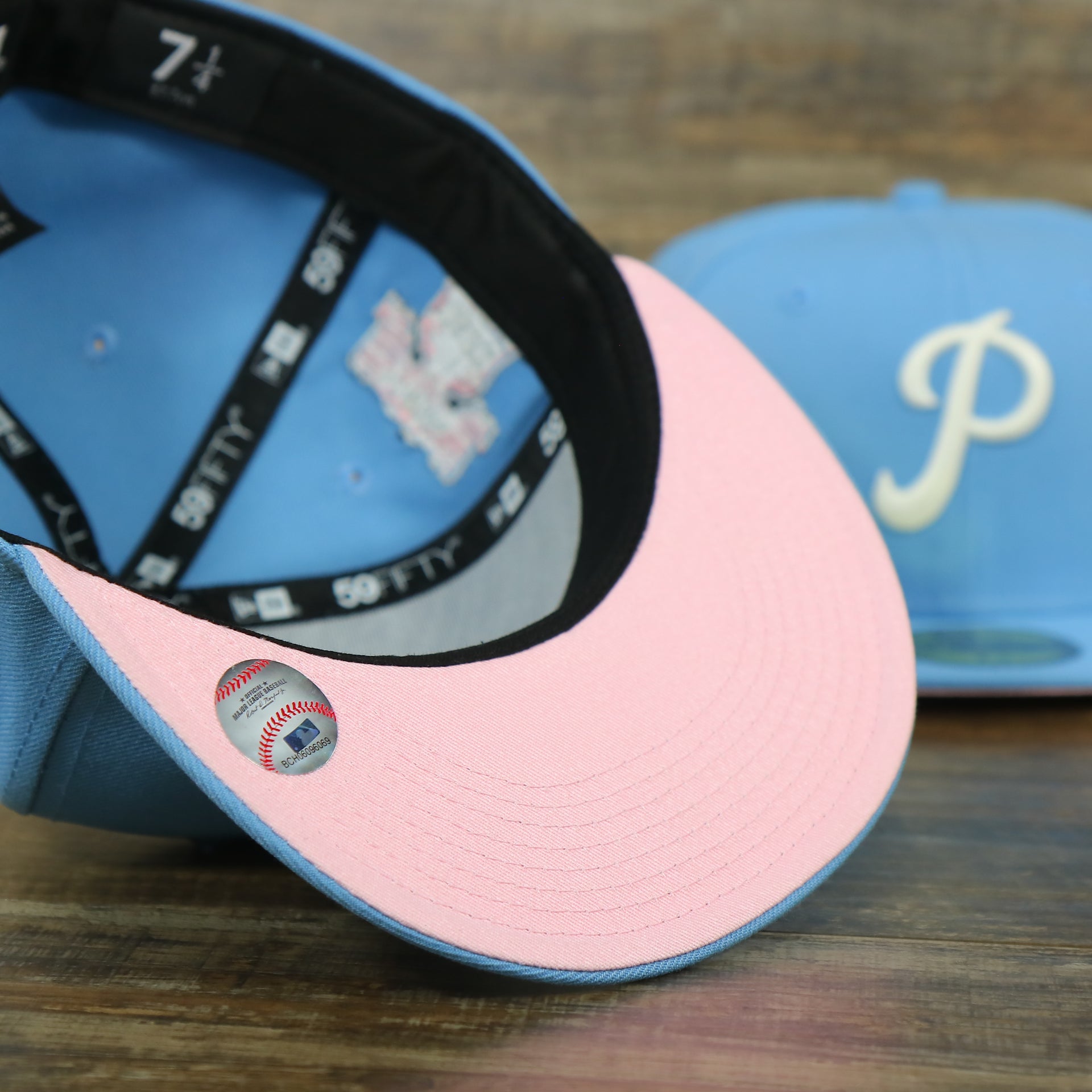 pink under visor on the Philadelphia Phillies Glow In The Dark 1952 All Star Game Patch Pink Bottom Side Patch 59Fifty Fitted Cap