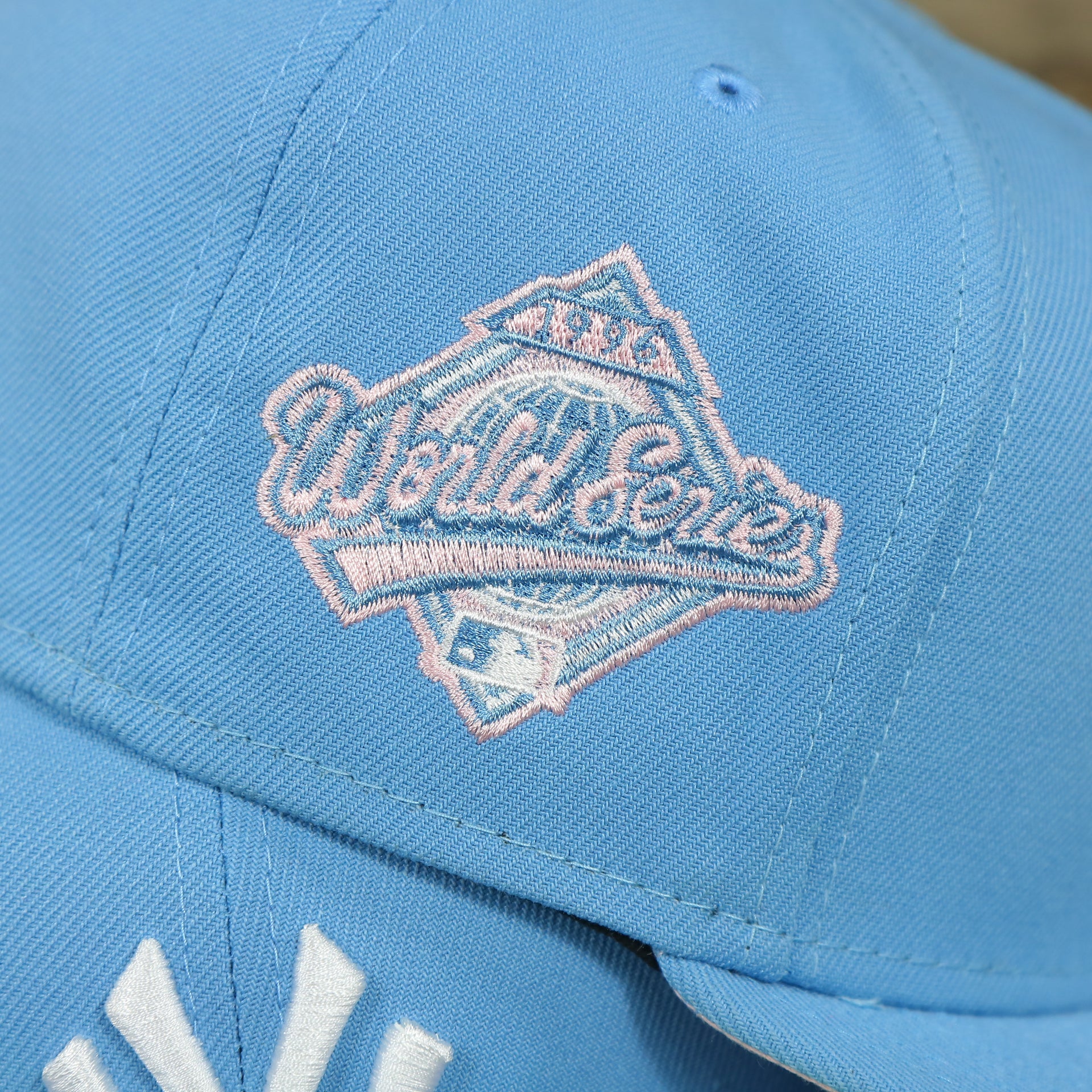 world series patch on the New York Yankees 1996 World Series Patch Pink Bottom 59Fifty Fitted Cap | Light Blue