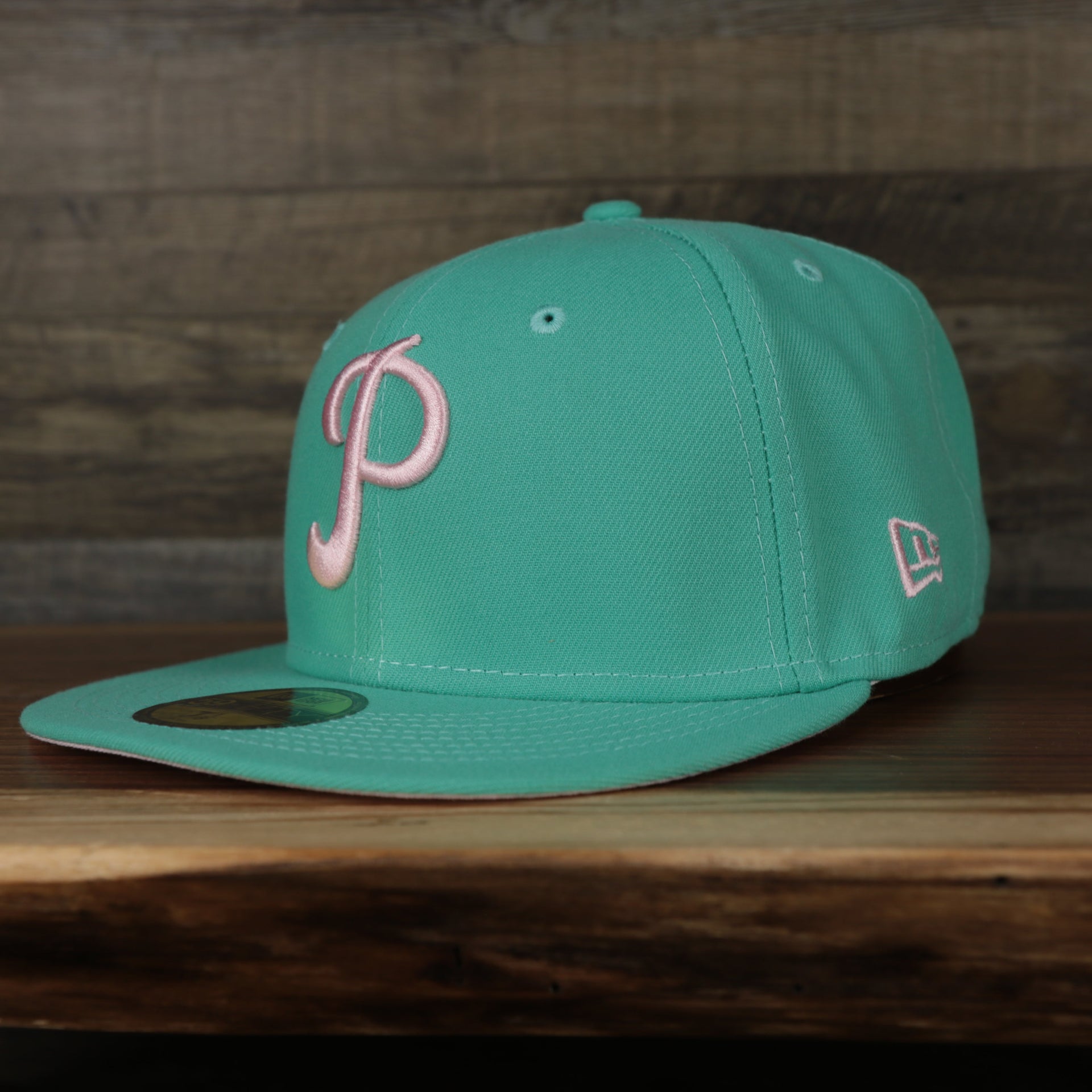 side shot of the Philadelphia Phillies 1952 Allstar Game Side Patch Pink Bottom 59Fifty Fitted Cap | Mint