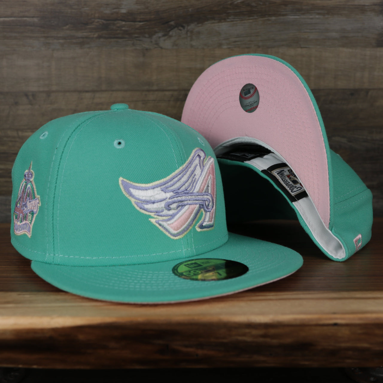 front and bottom of the Anaheim Angels 40th Anniversary Side Patch Pink Bottom 59Fifty Fitted Cap | Mint