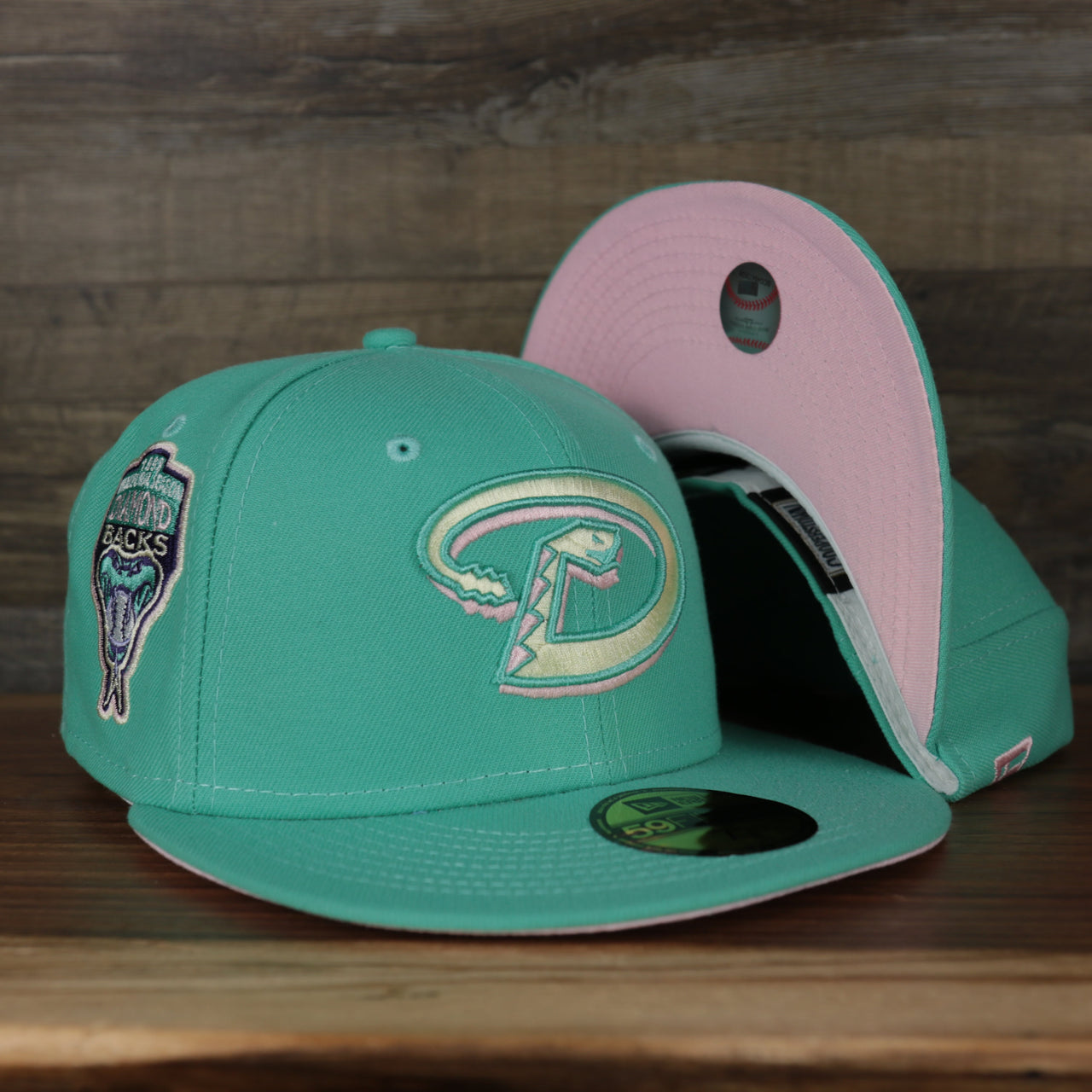 front of the Arizona Diamondbacks 1993 Inaugural Season Side Patch Pink Bottom 59Fifty Fitted Cap | Mint