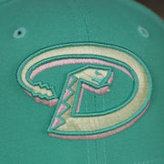 diamond backs logo on the Arizona Diamondbacks 1993 Inaugural Season Side Patch Pink Bottom 59Fifty Fitted Cap | Mint