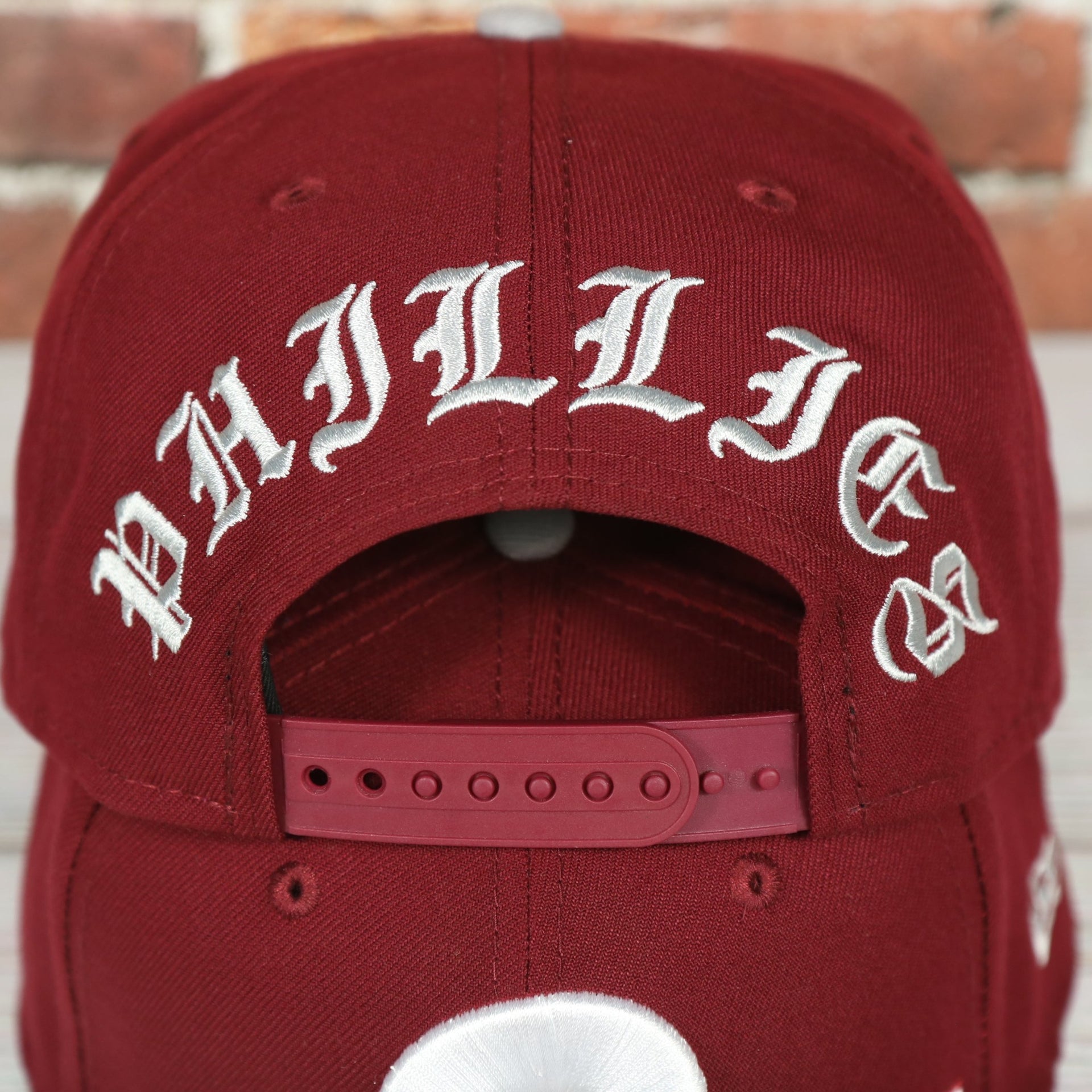phillies word arch on the Philadelphia Phillies Throwback Green Bottom White Back Letter Arch 9Fifty Snapback | Back Word Arch Maroon 9Fifty
