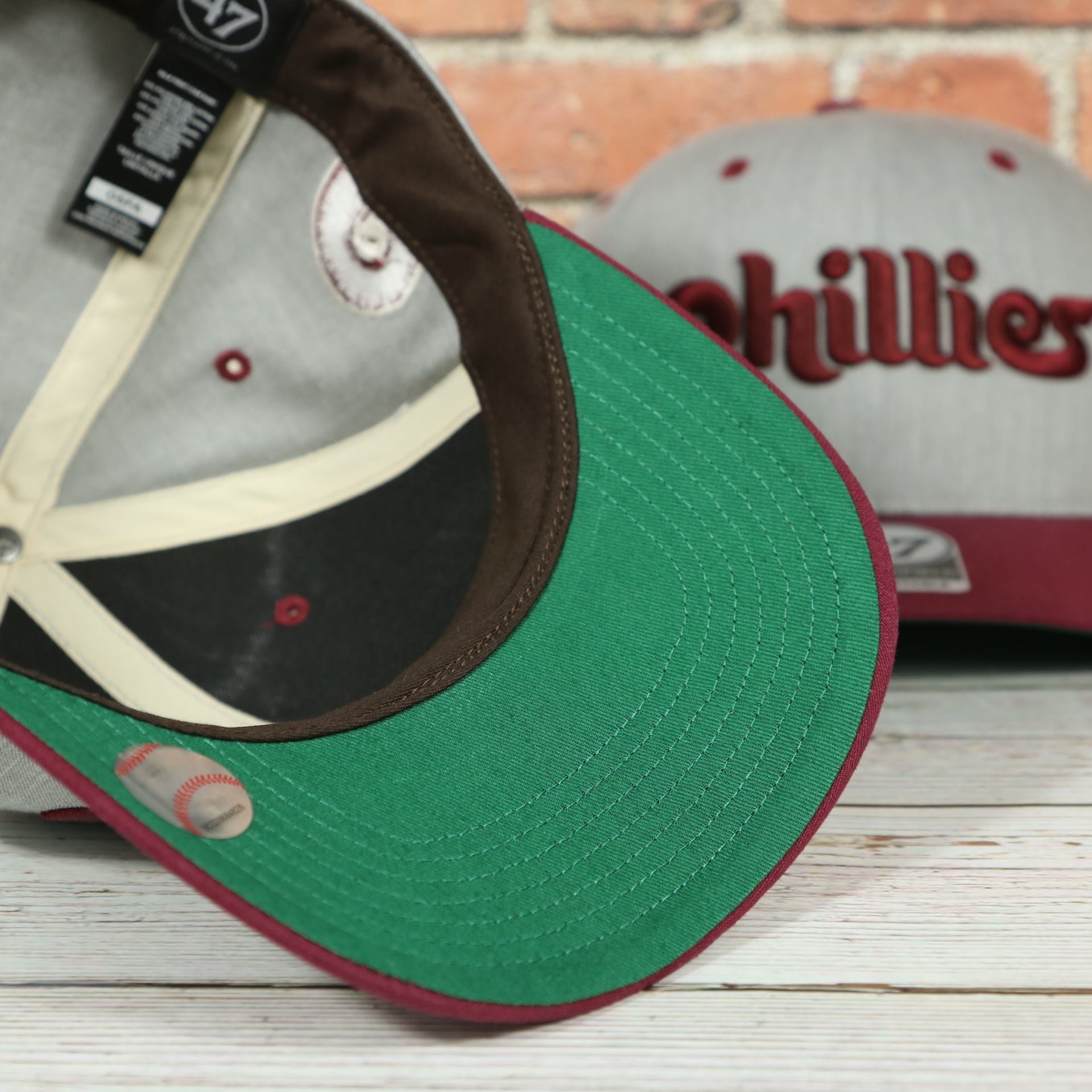 green under visor of the Cooperstown Phillies Wordmark Vintage Green Undervisor Side Patch Retro Snapback Hat | Gray Snapback