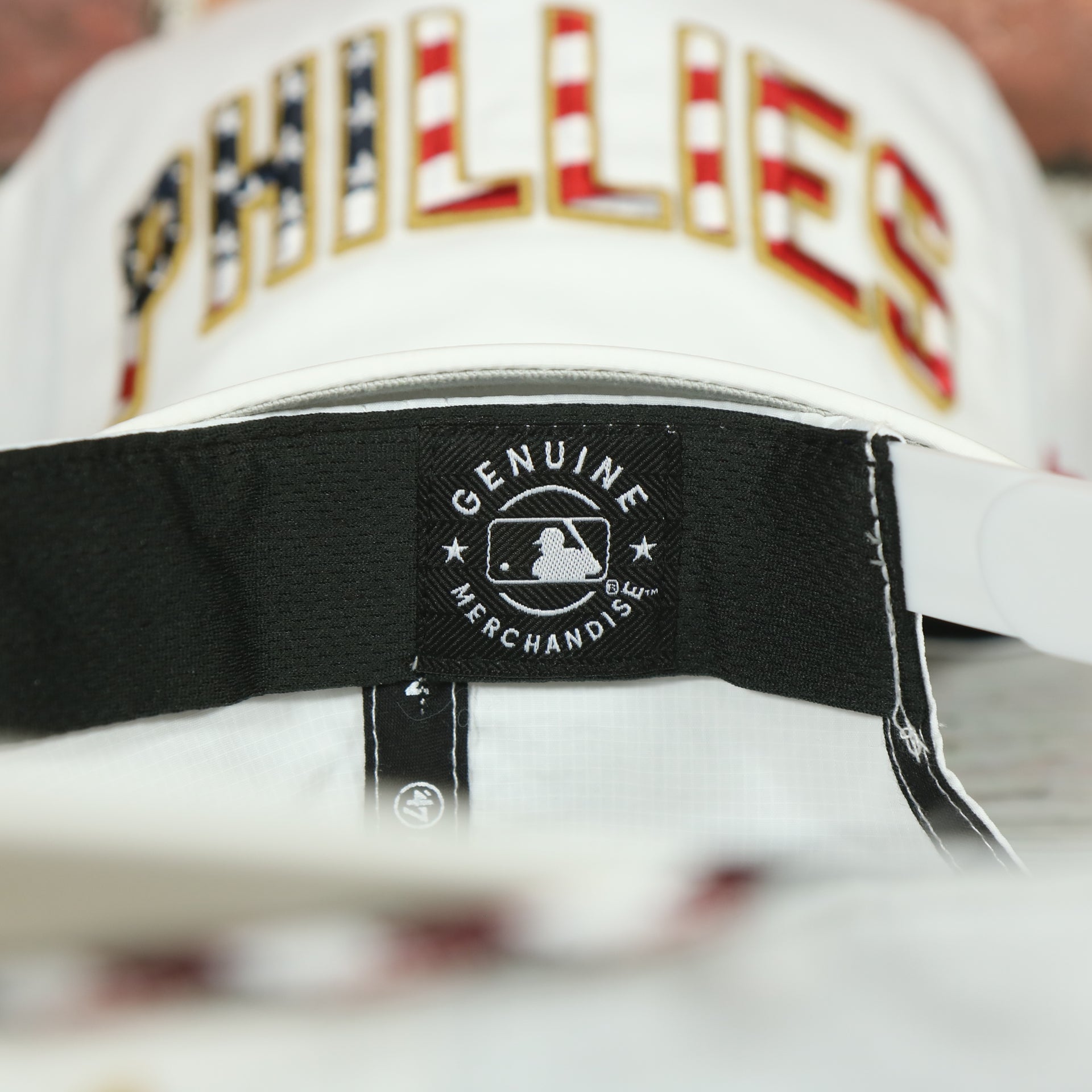 mlb label on the Philadelphia Phillies Stars and Stripes Wordmark Gray Bottom Dad Hat | White Dad Hat